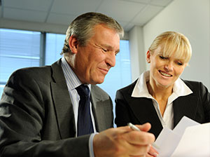 Business People Reviewing Image